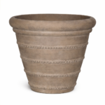 Weathered terracotta pot with decorative bands